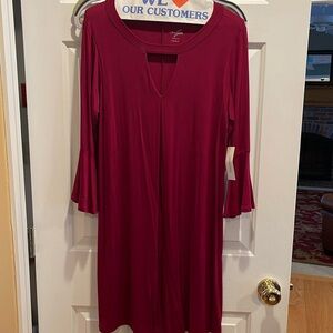 Francescas red long sleeved dress.